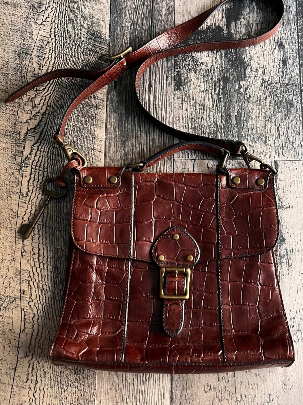 Fossil cherry wood coloured leather crocodile print satchel crossbody purse